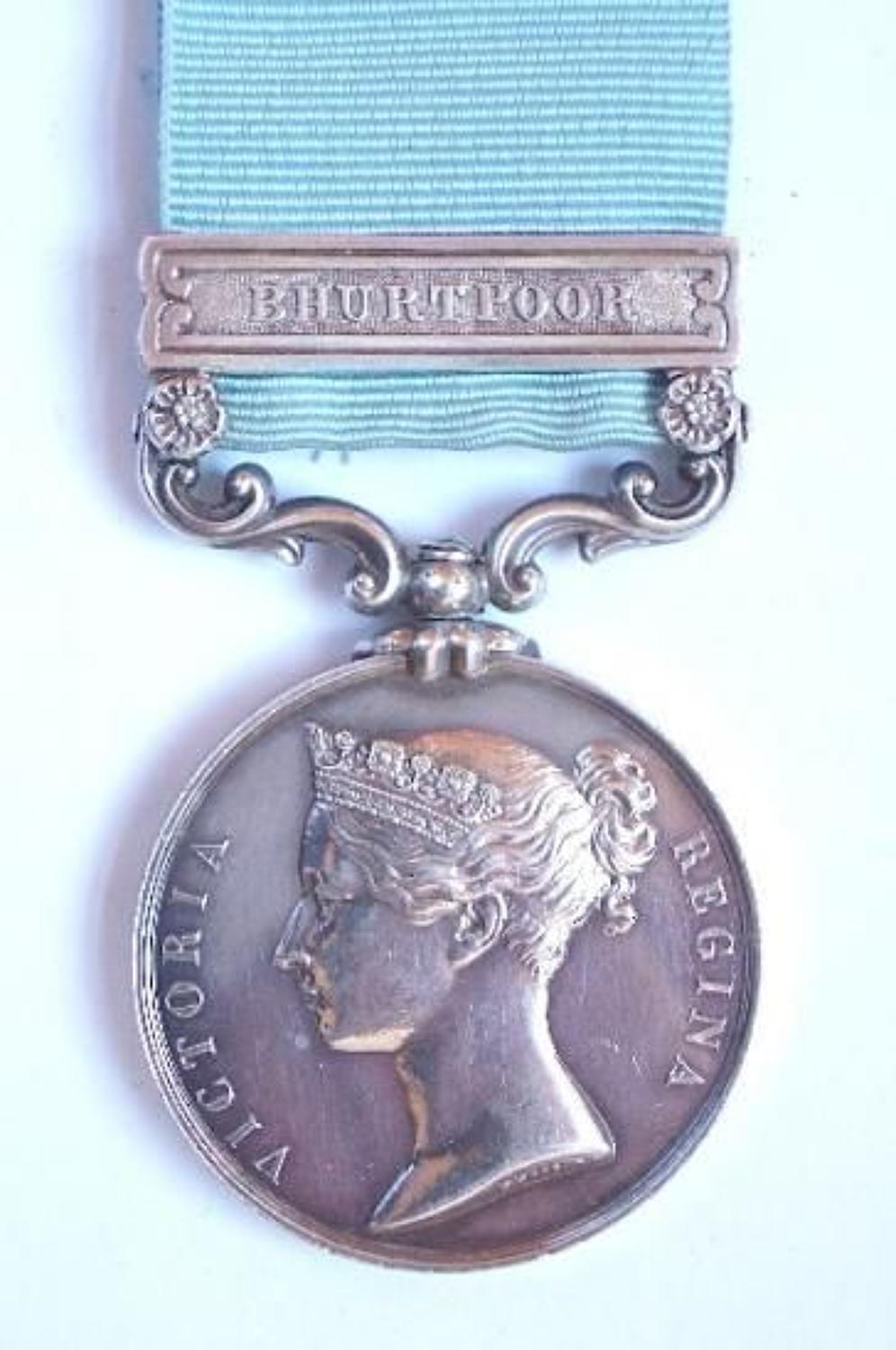 Army of India Medal 1799-1826, clasp  Bhurtpoor to 14th Foot.