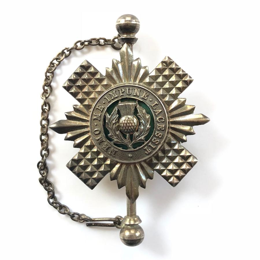 Scots Guards Piper’s 1970 hallmarked silver kilt pin.